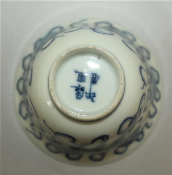 A pair of Chinese blue and white stem bowls, and a further bowl, late 19th / early 20th century, 9.5cm